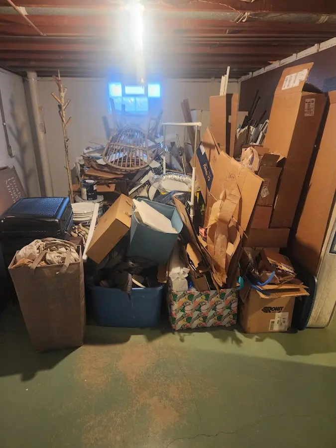 Roll-off dumpster container at job site for Yard Waste Dumpster Rental in Gladstone